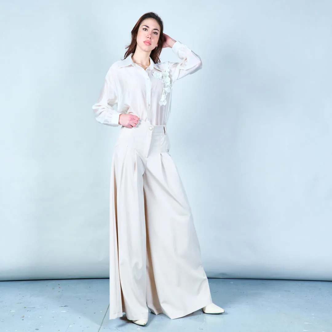 Pleated wide-leg trousers in Beige
